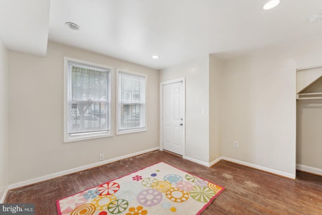 1707 H St NE, Washington, DC 20002 - unfurnished bedroom with wood finished floors, baseboards, and recessed lighting