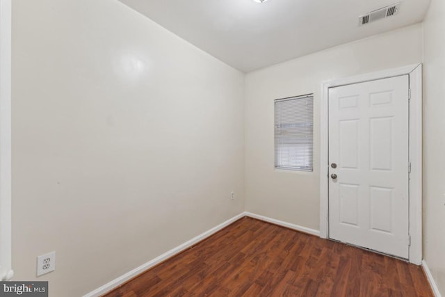 1707 H St NE, Washington, DC 20002 - spare room with dark wood-style floors and baseboards