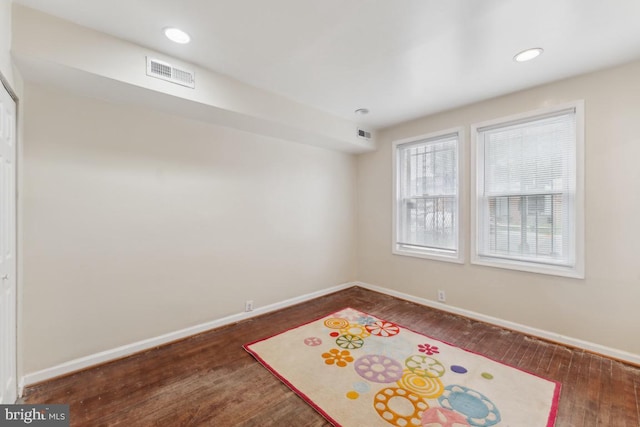 1707 H St NE, Washington, DC 20002 - empty room with baseboards, hardwood / wood-style flooring, and recessed lighting
