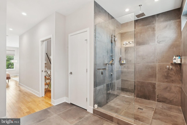 2811 Wharton St, Philadelphia, PA 19146 - bathroom with a walk in shower, recessed lighting, baseboards, and wood finished floors