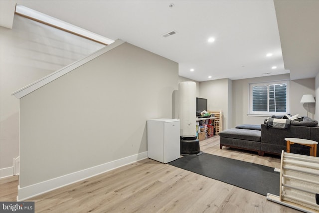 2811 Wharton St, Philadelphia, PA 19146 - living area featuring wood finished floors, recessed lighting, and baseboards