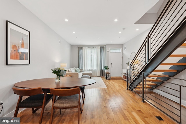 2811 Wharton St, Philadelphia, PA 19146 - dining room with stairs, light wood finished floors, baseboards, and recessed lighting