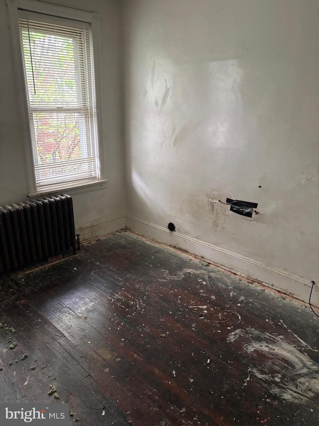 1436 S Etting St, Philadelphia, PA 19146 - spare room with radiator and hardwood / wood-style flooring