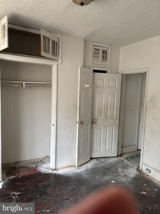 1436 S Etting St, Philadelphia, PA 19146 - unfurnished bedroom with a textured ceiling