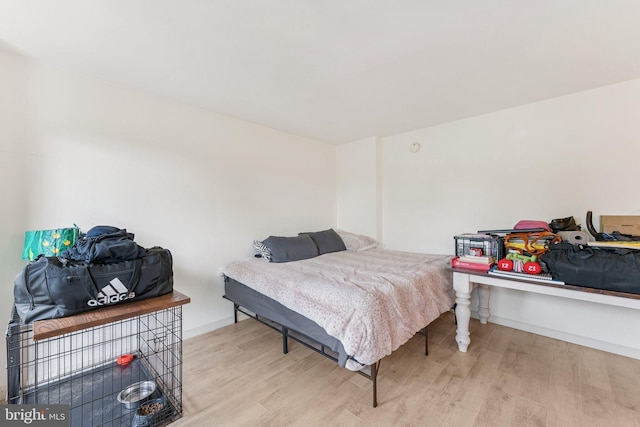 801 N Pitt St Unit 505, Alexandria, VA 22314 - bedroom featuring wood finished floors and baseboards
