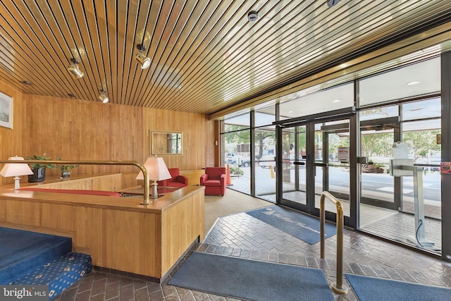 801 N Pitt St Unit 505, Alexandria, VA 22314 - lobby featuring wood walls and expansive windows
