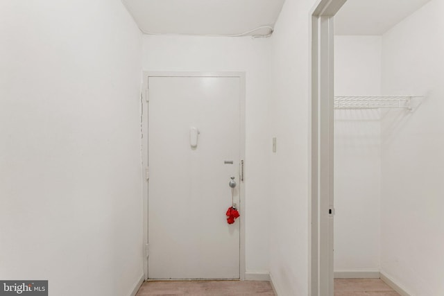 801 N Pitt St Unit 505, Alexandria, VA 22314 - corridor featuring light wood-type flooring and baseboards