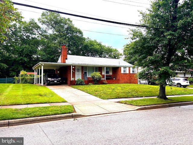 5803 87th Ave, Hyattsville, MD 20784 - ranch-style house with a chimney, driveway, brick siding, and an attached carport