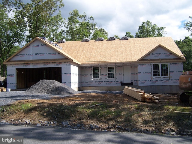 223 Fairview Oaks Ln, Berkeley Springs, WV 25411 - unfinished property featuring an attached garage and roof with shingles