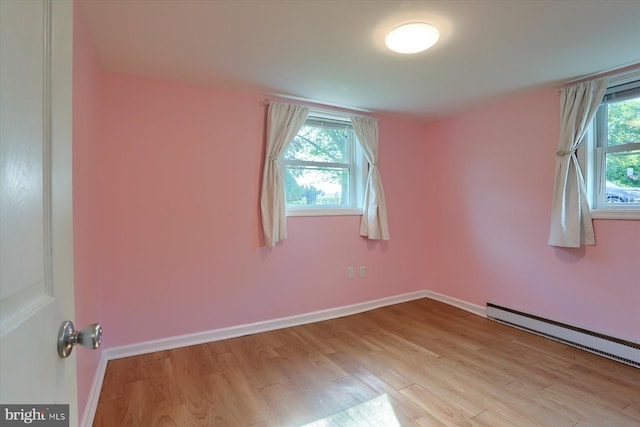 1507 Hemlock Ave, Carlisle, PA 17013 - spare room with a baseboard radiator, light wood-style floors, and healthy amount of natural light