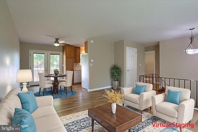 1507 Hemlock Ave, Carlisle, PA 17013 - living area featuring light wood-style flooring, a ceiling fan, and baseboards