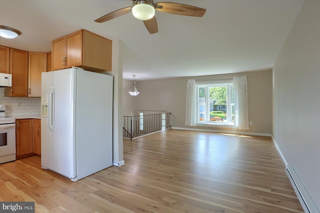 1507 Hemlock Ave, Carlisle, PA 17013 - kitchen featuring white appliances, open floor plan, light wood finished floors, a baseboard radiator, and a ceiling fan