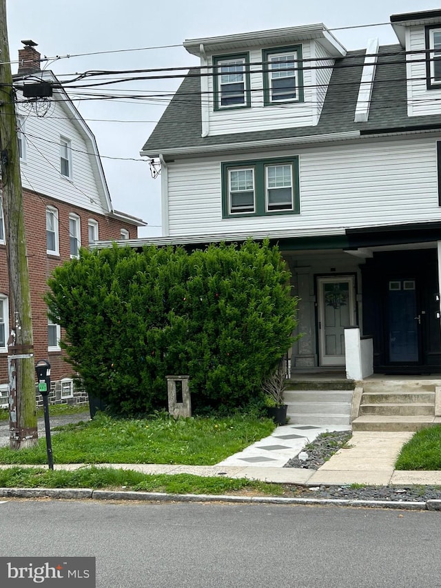 2718 E County Line Rd, Ardmore, PA 19003 - view of front facade with a shingled roof