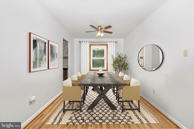 10801 Oak Valley Dr, Hagerstown, MD 21740 - dining room with light wood finished floors, baseboards, and a ceiling fan
