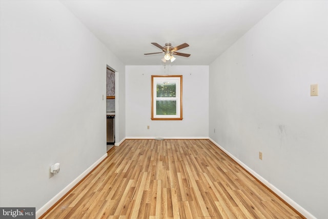 10801 Oak Valley Dr, Hagerstown, MD 21740 - unfurnished room with light wood finished floors, a ceiling fan, and baseboards