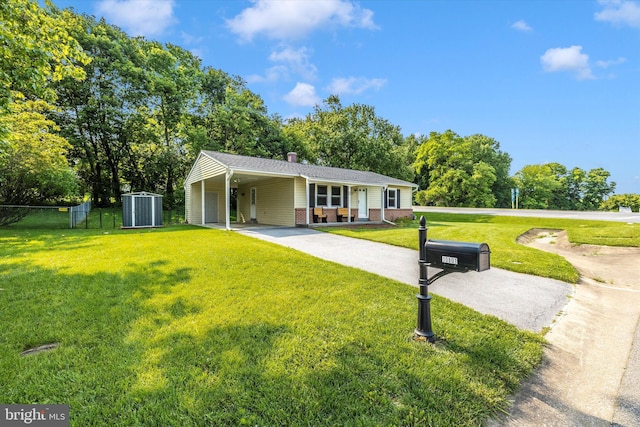 10801 Oak Valley Dr, Hagerstown, MD 21740 - ranch-style house with brick siding, a chimney, a porch, driveway, and view of scattered trees
