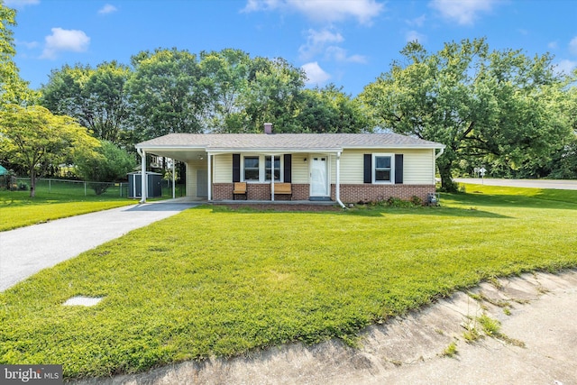 10801 Oak Valley Dr, Hagerstown, MD 21740 - view of front facade featuring brick siding, driveway, a carport, a chimney, and covered porch