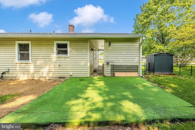 10801 Oak Valley Dr, Hagerstown, MD 21740 - back of property with a chimney and a lawn