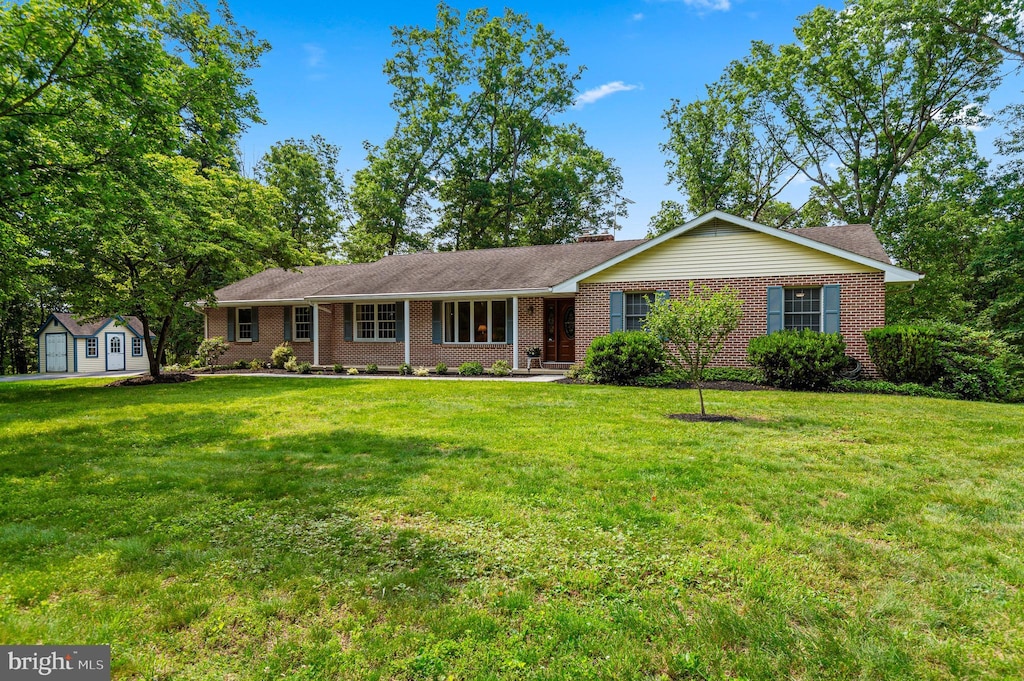 5 Lauriann Ct, Parkton, MD 21120 - single story home with brick siding, a front yard, and a chimney