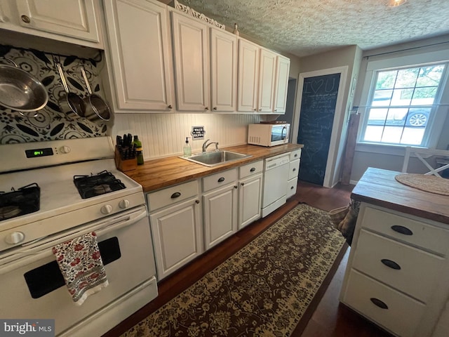 4306 National Pike, Markleysburg, PA 15459 - kitchen with white appliances, wood counters, a sink, white cabinets, and a textured ceiling