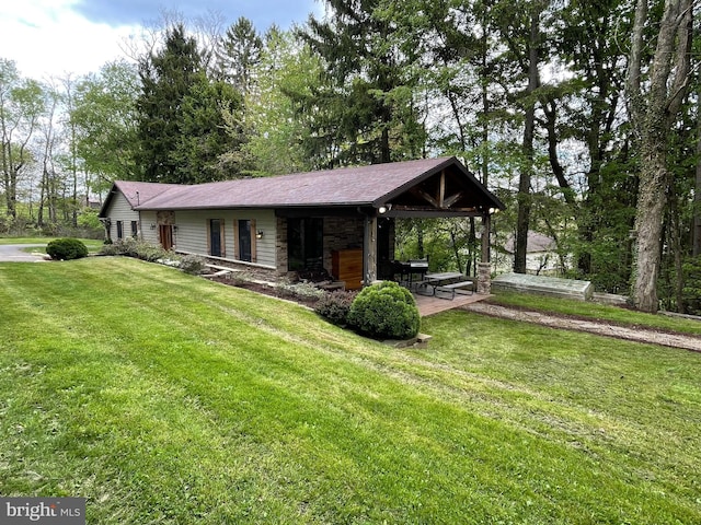4306 National Pike, Markleysburg, PA 15459 - view of front of property with a front yard and stone siding