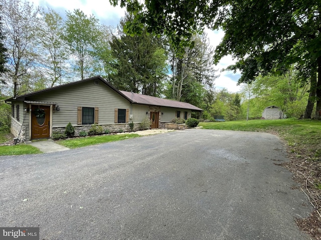 4306 National Pike, Markleysburg, PA 15459 - view of front of house featuring stone siding and a front yard