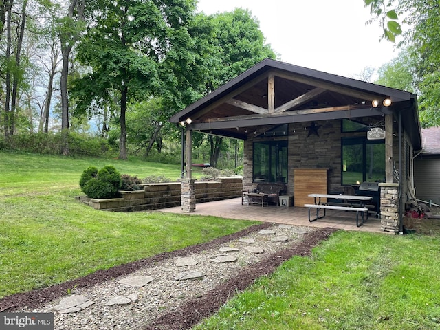 4306 National Pike, Markleysburg, PA 15459 - view of grassy yard with a patio area