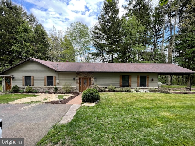 4306 National Pike, Markleysburg, PA 15459 - single story home featuring a front yard, stone siding, and a carport