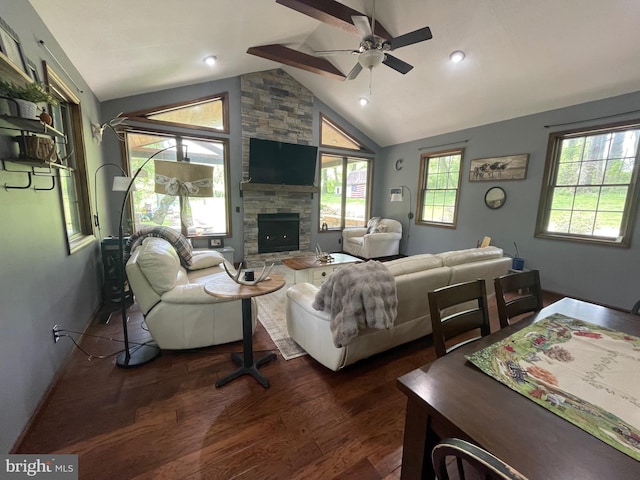 4306 National Pike, Markleysburg, PA 15459 - living room featuring ceiling fan, a stone fireplace, vaulted ceiling, dark wood-style flooring, and baseboards