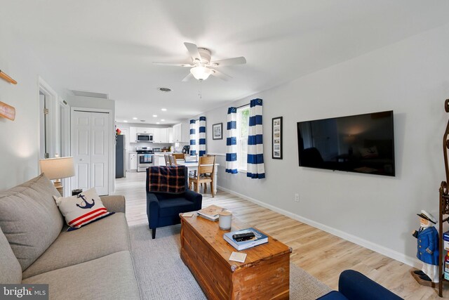 21363 Indiana Ave, Chestertown, MD 21620 - living room with light wood-style flooring, ceiling fan, baseboards, and recessed lighting