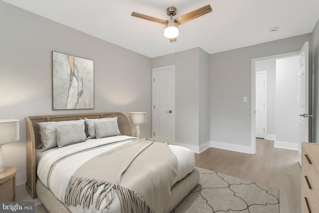 1724 W Abingdon Dr Unit 201, Alexandria, VA 22314 - bedroom with light wood finished floors and a ceiling fan