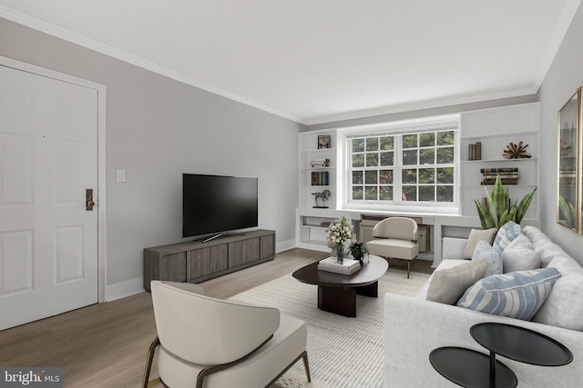 1724 W Abingdon Dr Unit 201, Alexandria, VA 22314 - living room featuring ornamental molding, wood finished floors, and built in features