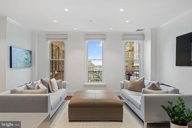 1901 Walnut St Unit 20E, Philadelphia, PA 19103 - living area with crown molding, recessed lighting, and light wood-style floors