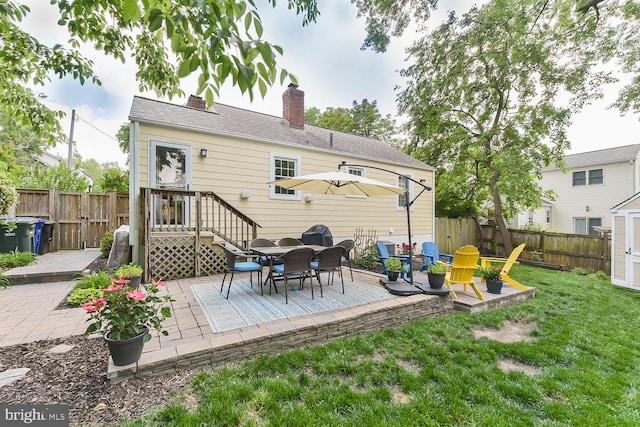 3819 14th St S, Arlington, VA 22204 - rear view of house featuring a chimney and a patio