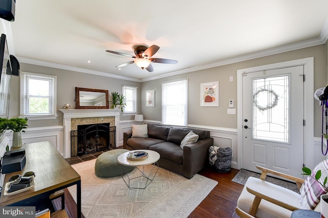 3819 14th St S, Arlington, VA 22204 - living area with ceiling fan, wainscoting, ornamental molding, a premium fireplace, and wood finished floors