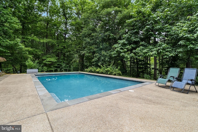 4510 Fish Hawk Ct, Chesapeake Beach, MD 20732 - outdoor pool with a patio area