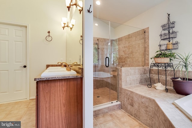 4510 Fish Hawk Ct, Chesapeake Beach, MD 20732 - full bath with a relaxing tiled tub, tile patterned flooring, a stall shower, and double vanity
