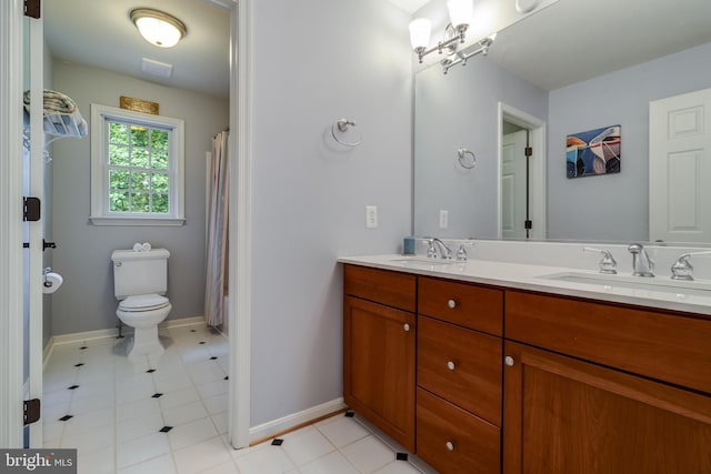4510 Fish Hawk Ct, Chesapeake Beach, MD 20732 - bathroom with double vanity and tile patterned flooring