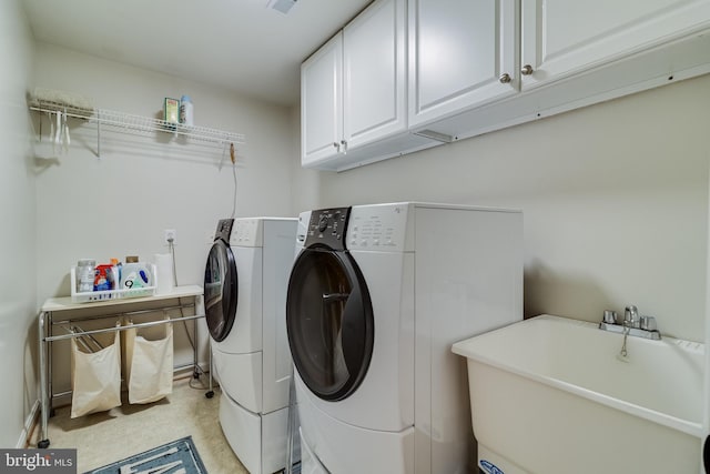 4510 Fish Hawk Ct, Chesapeake Beach, MD 20732 - laundry area with independent washer and dryer and cabinet space