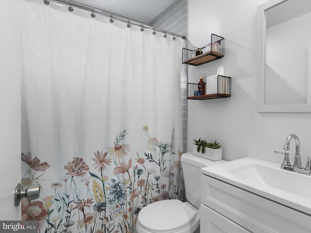 5902 Amelia St, Springfield, VA 22150 - bathroom featuring toilet, vanity, and a shower with shower curtain