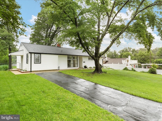 5902 Amelia St, Springfield, VA 22150 - ranch-style house with asphalt driveway, a chimney, and roof with shingles