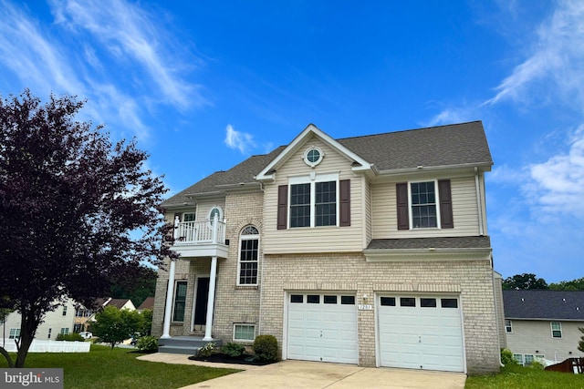 1201 Alder Shot Ct, Abingdon, MD 21009 - view of front of home featuring a balcony, driveway, an attached garage, a front lawn, and brick siding
