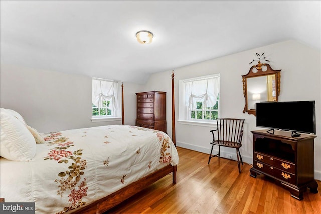 716 Old Gulph Rd, Bryn Mawr, PA 19010 - bedroom with wood finished floors, vaulted ceiling, and baseboards
