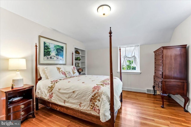 716 Old Gulph Rd, Bryn Mawr, PA 19010 - bedroom with wood finished floors, lofted ceiling, and baseboards