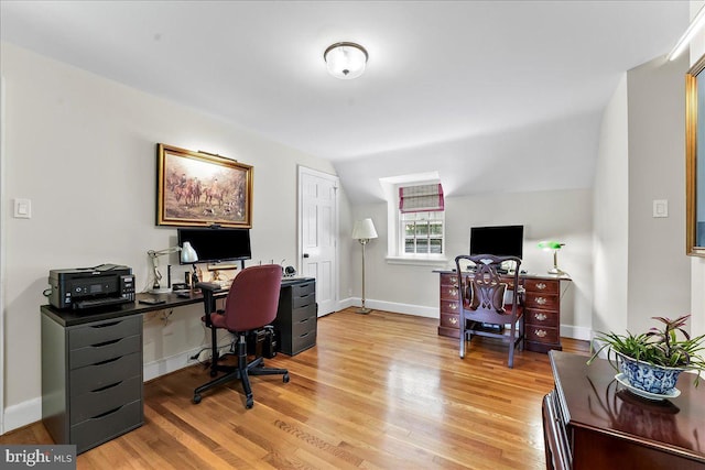 716 Old Gulph Rd, Bryn Mawr, PA 19010 - home office with light wood finished floors, vaulted ceiling, and baseboards