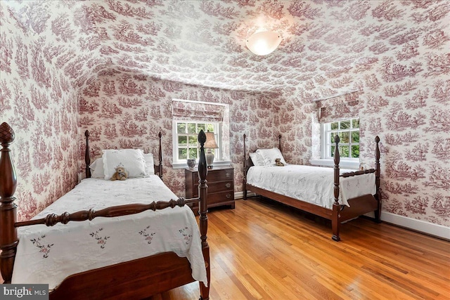 716 Old Gulph Rd, Bryn Mawr, PA 19010 - bedroom featuring wallpapered walls and light wood finished floors