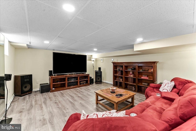 716 Old Gulph Rd, Bryn Mawr, PA 19010 - living room featuring recessed lighting, wood finished floors, a paneled ceiling, and baseboards