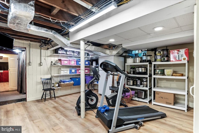 716 Old Gulph Rd, Bryn Mawr, PA 19010 - exercise room featuring wood finished floors and a paneled ceiling