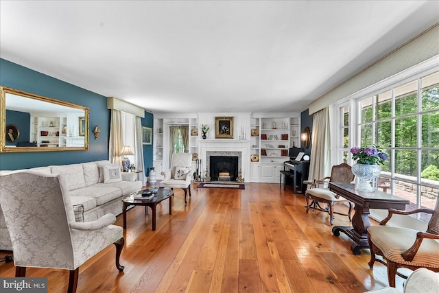 716 Old Gulph Rd, Bryn Mawr, PA 19010 - living room with light wood finished floors and a fireplace with raised hearth