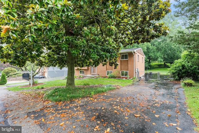 1157 Pine Tree Dr, Annapolis, MD 21409 - view of front facade featuring brick siding